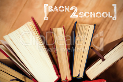 Composite image of back to school text over white background