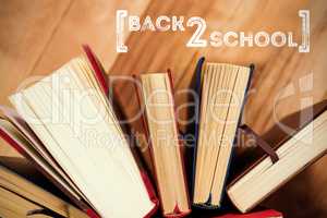 Composite image of back to school text over white background