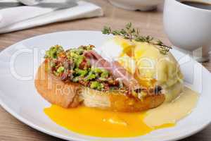 Toast with guacamole with egg Benedict