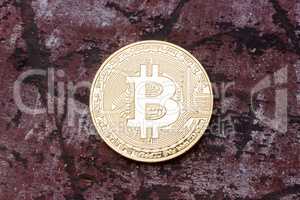 Close up of golden bitcoin.