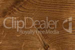 Natural cinnamon oak wood background texture, top view.