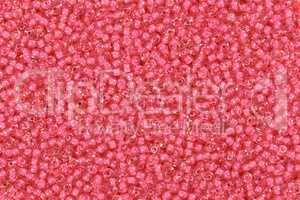 Pink glass beads. Close up shot.