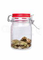 Marijuana and cannabis, jar of weed on white background