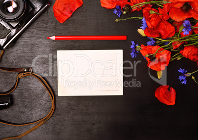 blank greeting card and a red pencil