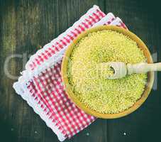 Millet cereal in a wooden plate