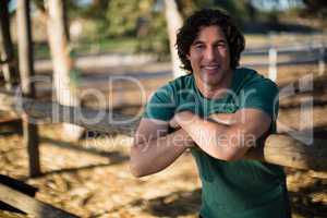 Man smiling at camera in the ranch