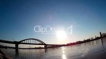 View Of The River and Bridge With Traffic On It in Timelapse