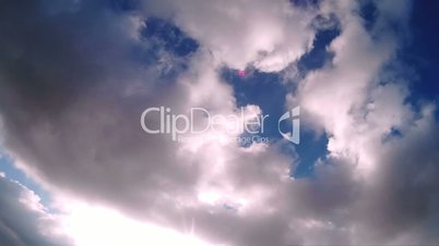 White Fluffy Clouds Moving In The Sky Timelapse