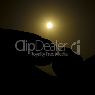 Nigh scene with rocks and moon