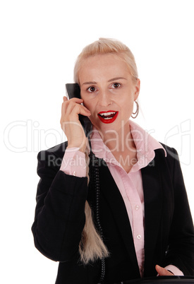 Business woman talking on an old phone