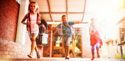 Kids running in school corridor