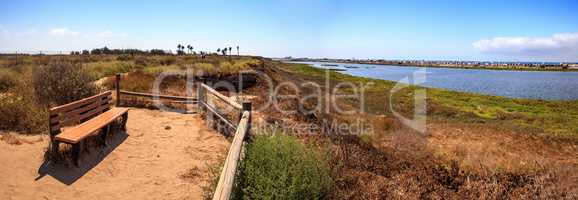 Bench overlooking the peaceful and tranquil marsh of Bolsa Chica