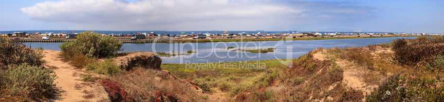 Path along the peaceful and tranquil marsh of Bolsa Chica wetlan