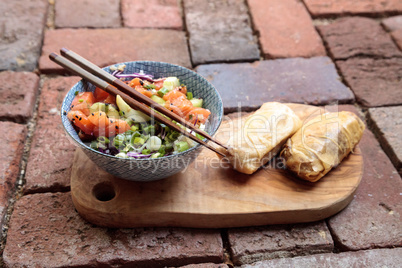 Raw salmon poke bowl with rice