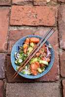 Raw salmon poke bowl with rice