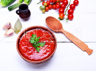 Soup gazpacho in a brown plate