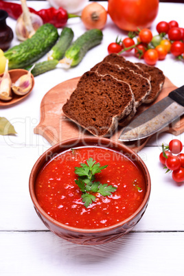 Soup gazpacho in a brown plate