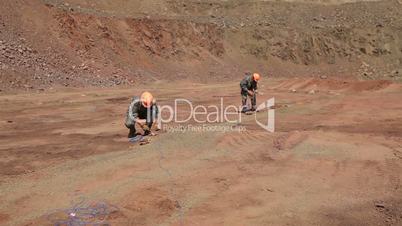 Iron ore mining, preparing for blasting in a quarry mining iron ore, Explosive