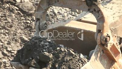 Bucket of industrial excavator close-up