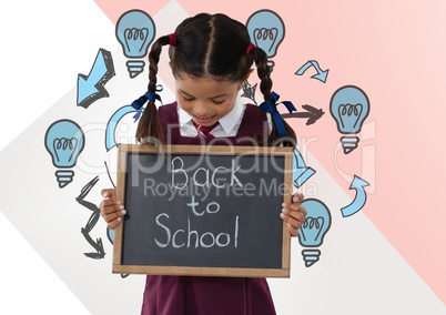 Girl holding back to school blackboard with light bulbs