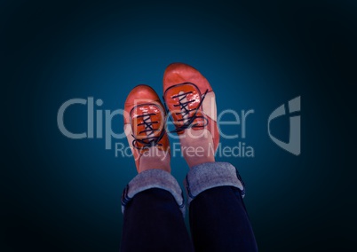 red shoes on feet with blue background
