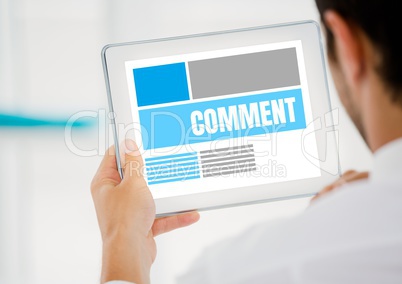 Comment text and graphic on tablet screen with mans hands