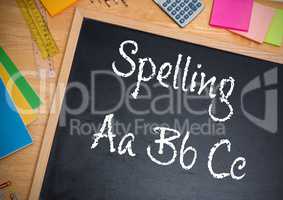 Hand writing Spelling text on blackboard