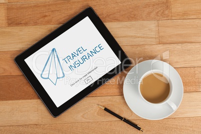 Tablet with travel insurance concept on screen