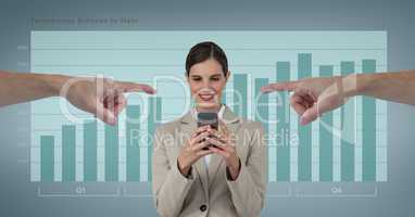 Hands pointing at happy business woman using her phone against blue background with infographics