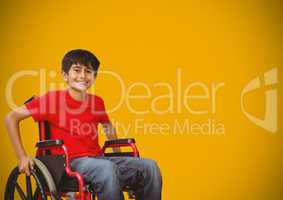 Disabled boy in wheelchair with yellow background