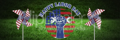 Happy labor day text and USA wind catchers in front of grass