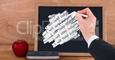 Hand writing i will stop bullying on blackboard
