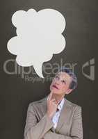 Business woman with speech bubble thinking against grey background