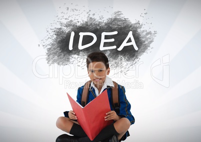 Schoolboy reading under idea text