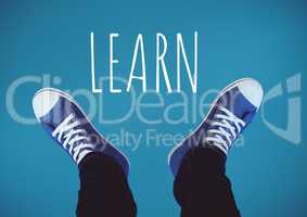 Learn text and Blue shoes on feet with blue background