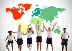Multicultural Kids jumping in front of colorful world map
