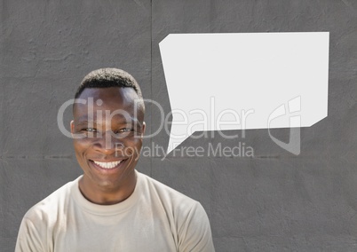 Happy soldier with speech bubble against grey background