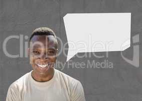 Happy soldier with speech bubble against grey background