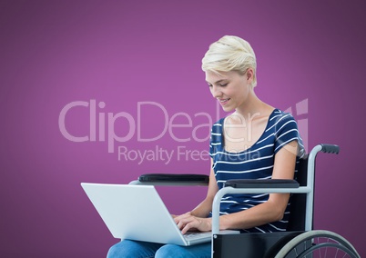 Disabled woman in wheelchair on laptop with purple background
