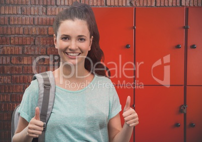 female student in front of lockers