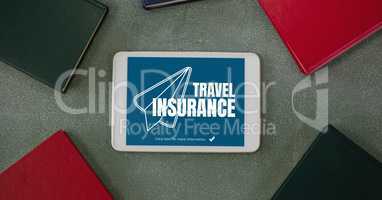 Tablet with travel insurance concept on screen