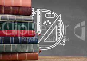 Books on the table against grey blackboard with education and school graphics