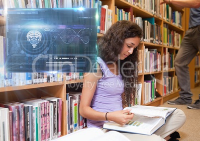 Female Student studying with book and science education interface graphics overlay