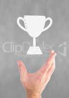 Person holding a trophy icon
