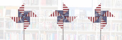 USA wind catchers in front of library shelves