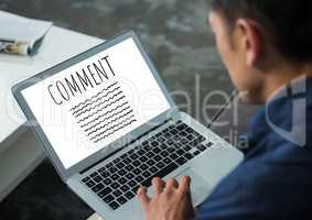 Comment text and graphic on laptop screen with mans hands