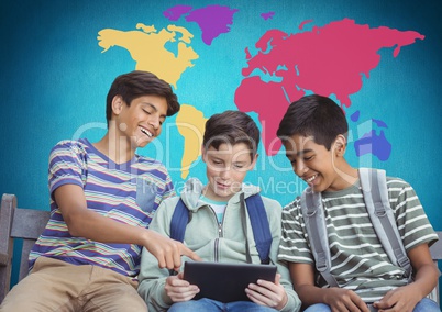Kids on tablet in front of colorful world map