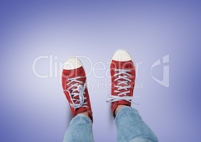 Red shoes on feet with purple background