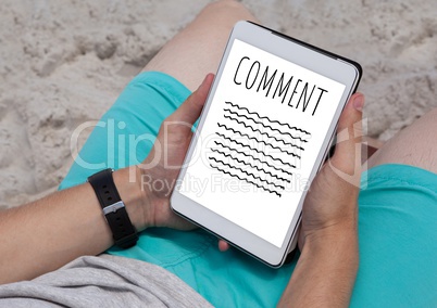 Comment text and writing graphic on tablet screen with hands