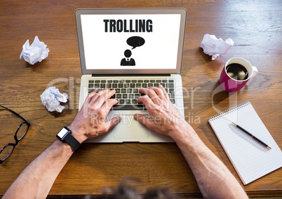 Trolling text and chat icon on laptop with hands